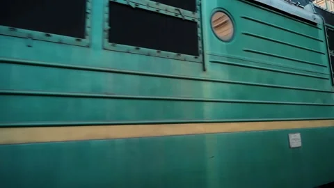 Train with people inside arrives at the station, close up of a train window Stock Footage 176432080