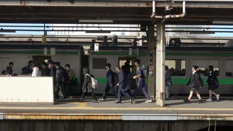A train platform at dusk, Chitose Station, Hokkaido, Japan, May 24, 2025. Stock Footage 335736150
