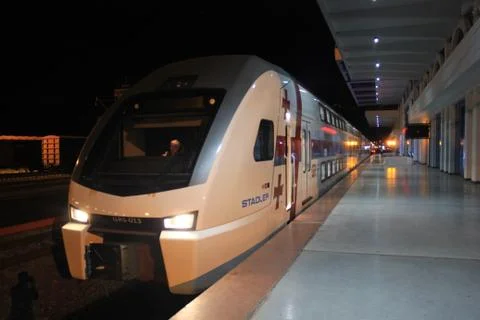 Train on the platform Stock Photos