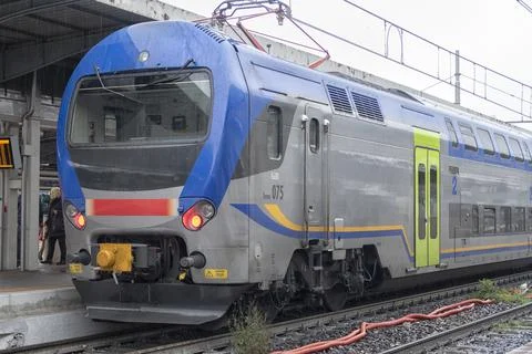 Train on platform at the railway station. Stock Photos