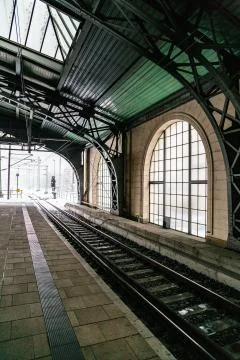 Train platforme with semaphore on snowy winter day Stock Photos