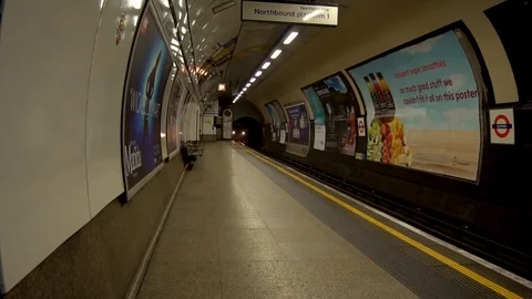 Train pulling in at Euston station. 100fps, Speed Ramp Stock Footage 85481159
