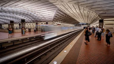 Train pulling into Metro Center station in Washington, D.C. long exposure Stock Photos