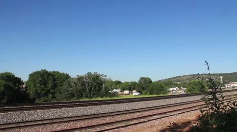 A train pulling out of a rail yard Stock Footage 58941820