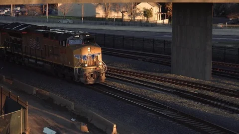 Train Pulling Into Rail Yard Video stock 71239912
