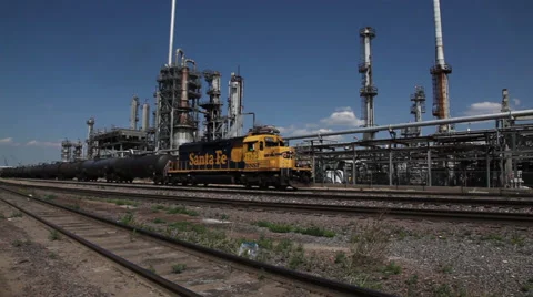Train pulls into industrial area Video stock 39671479