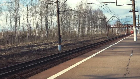 The train pulls up to the platform. Russia St. Petersburg 04-15-2020 Electric Stock Footage 128461753