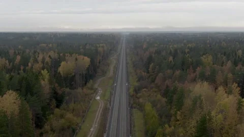 The train pulls up to a stop. air view. High quality 4k footage Stock Footage 194972936