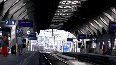 A train pulls into Zurich train station Stock Footage 114818771