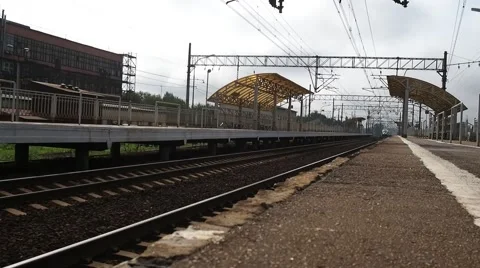 Train quickly goes past the station Stock Footage 66790979