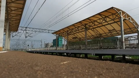 Train quickly goes past the station Stock Footage 66790986