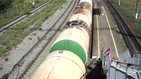 A train on a railroad track Stock-Footage 145150291