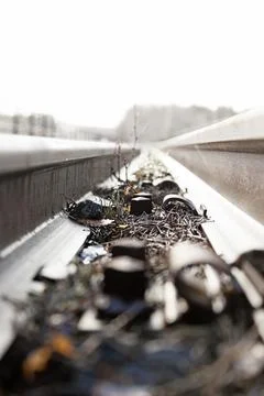Train rails in close-up on old bridge that is no longer used Stock Photos