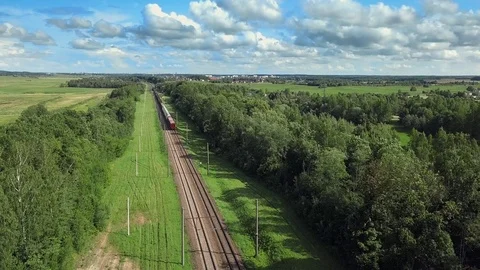 Train on the Rails. Following The Freight Train, Aerial Video stock 114077308