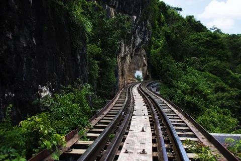 Train railway track between hellfire pass mountain and Si Sawat or Khwae Kwai Stock Photos
