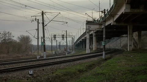 Train on the railway under the bridge Stock Footage 62681720
