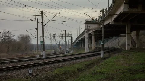 Train on the railway under the bridge Stock Footage 62681730