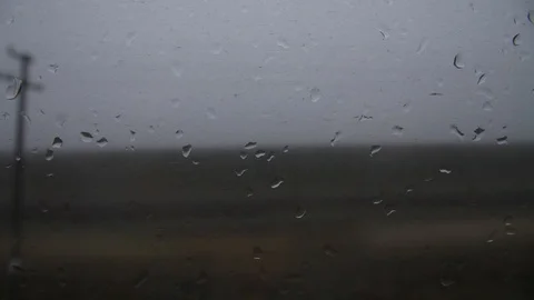 On a train in the rain, drops of water Stock Footage 114584302