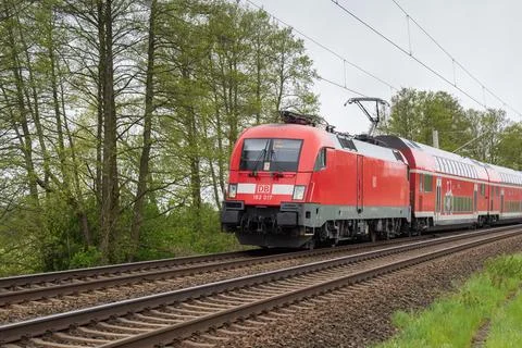 A train of the RE 2 line with double-decker coaches Stock Photos