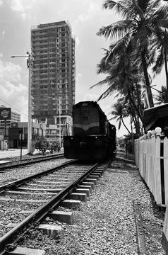 Train reaching in front close up black and white shot Stock Photos