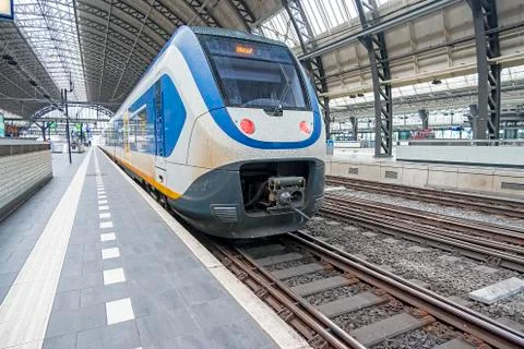 Train ready for departure on an empty central station in Amsterdam Netherland 스톡 사진