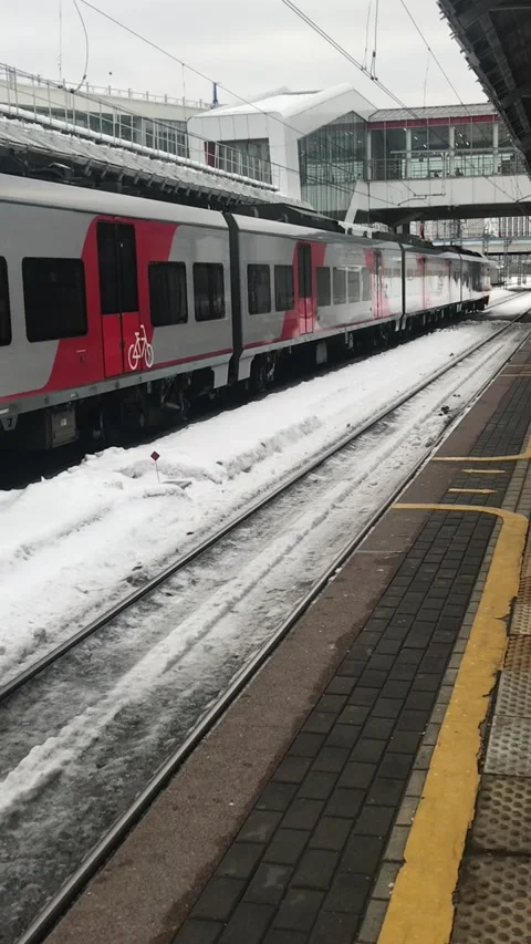 The train red colour arrives at the station Stock Footage 170246926