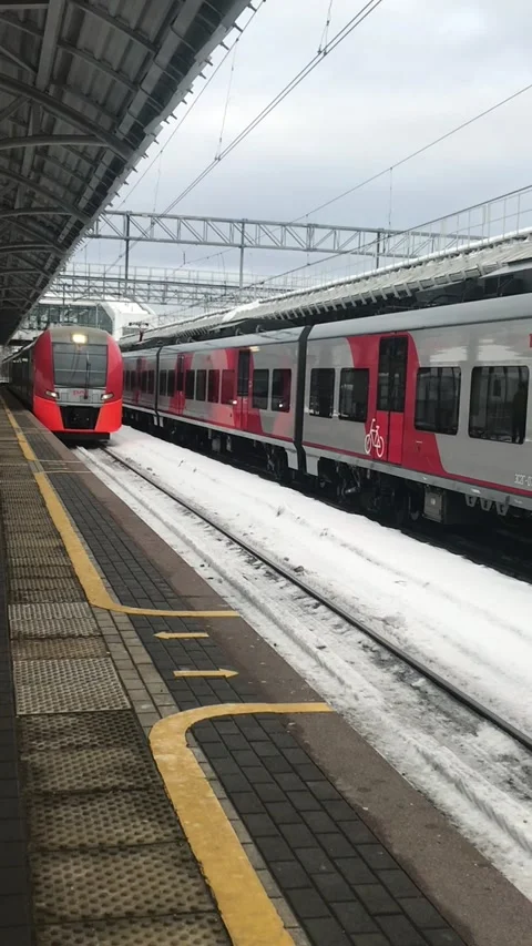 The train red colour arrives at the station Stock Footage 170246939