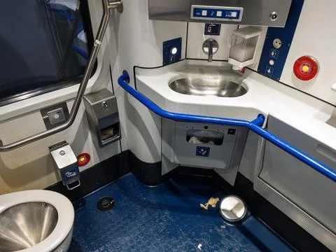 Train Restroom Interior: Cleanliness and Design Challenges Stock Photos