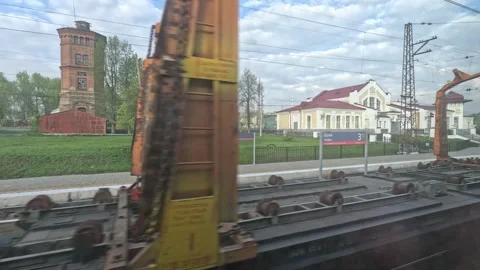 Train ride, siberia, forests, small village, oncoming loading wagons Stock Footage 244743820