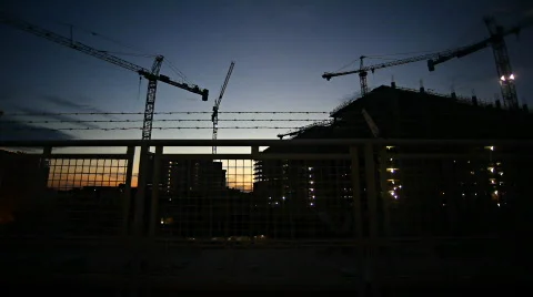 Train ride through construction at sunset Stock Footage 398981