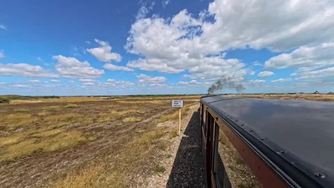 Train ride through Dungeness on the Romney Hythe and Dymchurch steam railway Stock-Footage 281487459