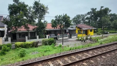 Train ride through landscapes on Java Island Stock Footage 336946955