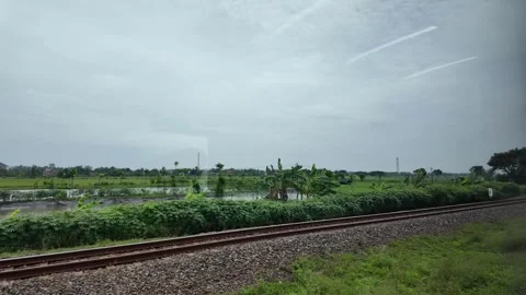 Train ride through landscapes on Java Island 스톡 동영상 336947061