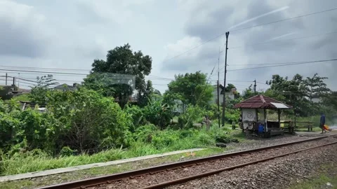 Train ride through landscapes on Java Island 스톡 동영상 336947075