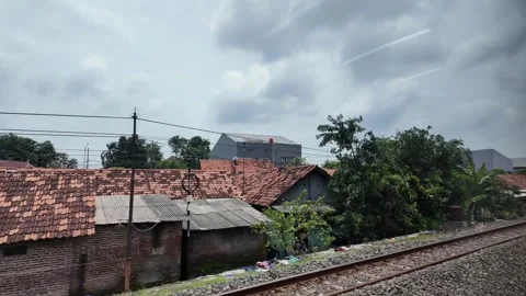 Train ride through landscapes on Java Island 스톡 동영상 336947112