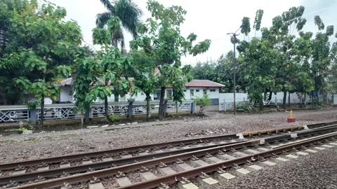 Train ride through landscapes on Java Island 스톡 동영상 336947228