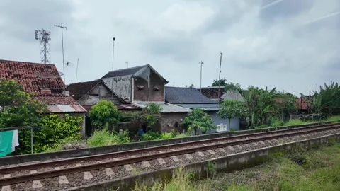 Train ride through landscapes on Java Island 스톡 동영상 336947313