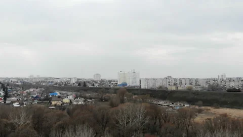 The train rides in the background of the city. Stock Footage 106342117