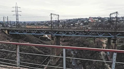 Train rides on the bridge city Stock Footage 98479115