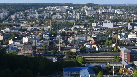 Train rides in the city. drone view Stock Footage 215189140