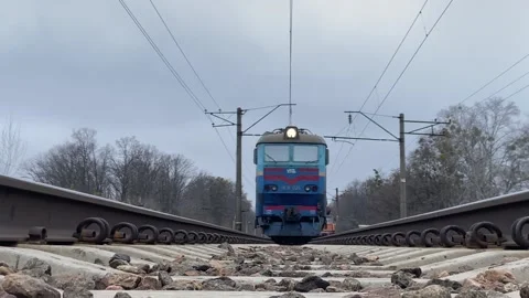 Train rides over the camera. Video stock 239896736