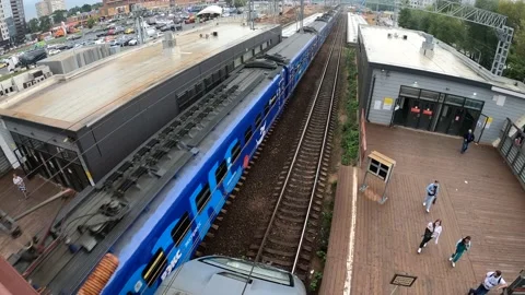 The train rides past the platforms. View from the bridge. Stock Footage 159644350