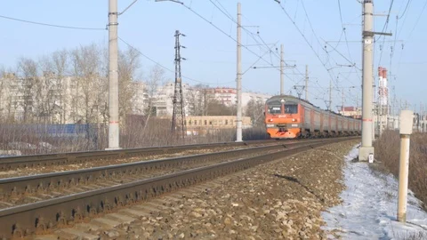 Train rides on rails, blue sky and communications Stock Footage 124494832