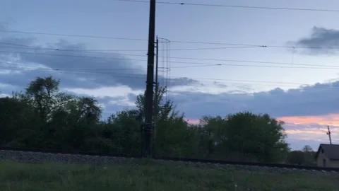 Train rides on rails on summer warm evening Stockbeeldmateriaal 132582968