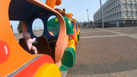 The train rides on the square Stock Footage 128870125