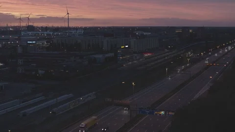Train riding into Antwerp at sunset Video stock 233637000