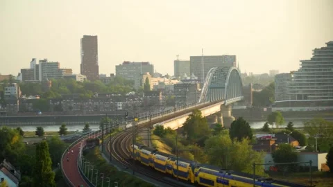 Train riding onto a bridge Video stock 292528886