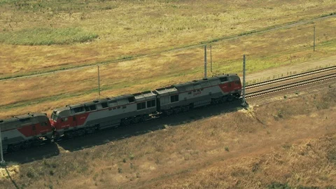 A train is riding on the field Stock Footage 101577025