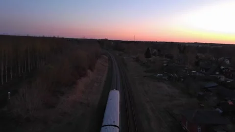 Train riding into sunset 動画素材 245859898