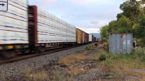 Train Rolling Through On A Cloudy Day (2 of 3) Stock Footage 43785558